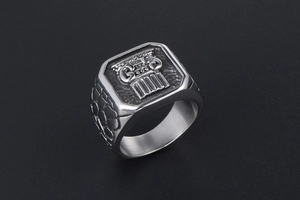 Macro detail of men's titanium ring featuring Ionic column relief and antique finish