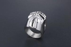 Detailed macro view showing the mechanical engine piston design of the heavy silver ring