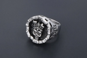 Macro detail of gothic skull ring in vintage steel finish with side number engraving