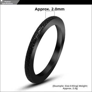 Detail view of a 2.0mm black titanium steel matte ring with a smooth inner surface