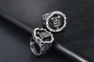 Macro view of vintage silver skull ring with gear edge and number engraving