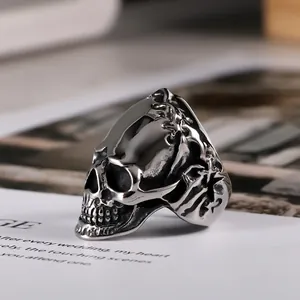 Gothic skull ring in retro titanium steel with intricate floral wreath details