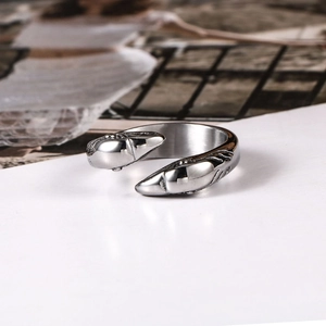 Polished stainless steel adjustable ring featuring a wrap-around shark animal design