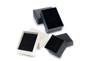 Textured diamond grid jewelry boxes in black and white with velvet foam inserts