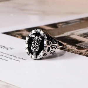 Gothic skull and cross swords embossed titanium steel ring in vintage silver finish