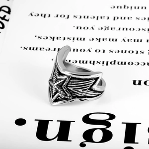Vintage titanium steel wide star ring with wings and black oxidized punk finish