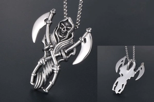 Detailed macro view showing the front and back of a gothic reaper scythe steel pendant
