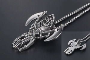 Macro detail of silver grim reaper pendant with scythe and box chain in steel