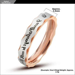 Detail of two-tone wave ring with brushed silver surface and rose gold edge