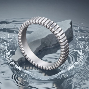 Titanium steel ring with industrial gear texture on water ripples background