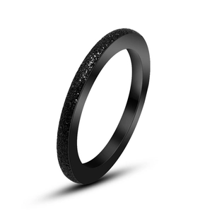 Minimalist matte black titanium steel ring for couples with polished inner edges and surface