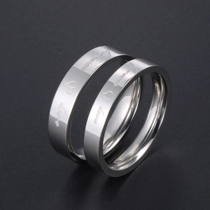 Polished stainless steel couple rings engraved with forever love and heart pattern