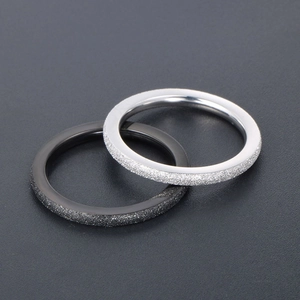 Minimalist matte titanium steel couple rings set in silver and black with polished inner band