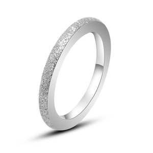 Minimalist matte titanium steel ring for couples featuring a sleek polished edge finish