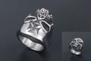 Detailed view of skull ring with iron cross relief in retro stainless steel finish