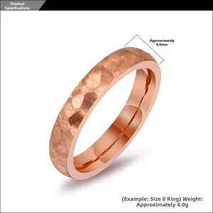 Detail view of 4mm rose gold titanium steel ring with hammered texture and weight data