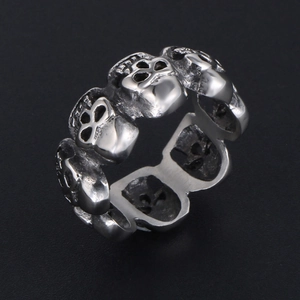 Retro gothic skull ring with blackened vintage finish and openwork punk metal design