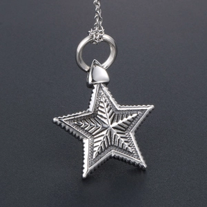 Vintage gothic star pendant necklace made of silver stainless steel with radial textures