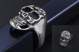 Detailed view of silver gothic skull ring made of titanium steel for men