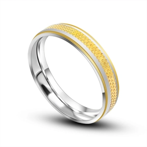 Minimalist gold and silver two-tone stainless steel ring with honeycomb texture
