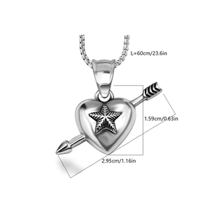 Detailed view of silver heart and arrow pendant with dimensions 2.95cm x 1.59cm