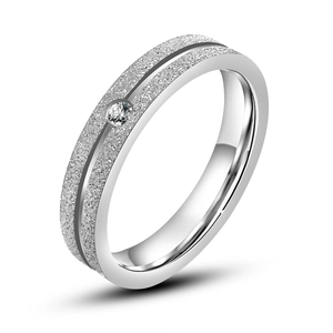Frosted titanium steel ring with a center sparkling diamond for couples minimalist design