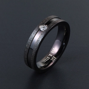 Black 316 stainless steel ring with matte sandblasted finish and central zircon stone