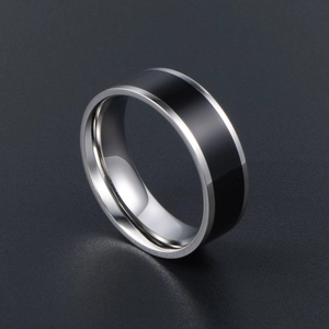 Modern black and silver stainless steel band ring for men with polished finish