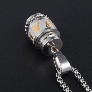 Rotating stainless steel Buddhist sutra pendant necklace with gold and silver finish