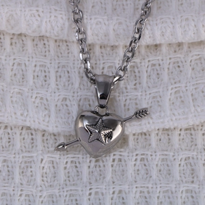 Silver stainless steel heart pendant necklace with star relief and arrow design