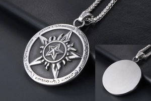 Detailed front and back views of vintage stainless steel star pendant with flame motif