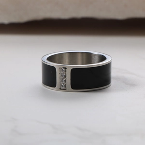 Minimalist titanium steel ring with black enamel band and four small diamonds