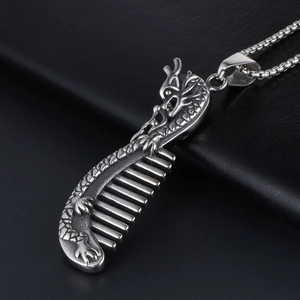Vintage silver dragon comb pendant necklace in stainless steel with carved details