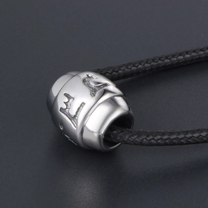 Titanium steel mantra bead pendant necklace with relief patterns and black woven cord