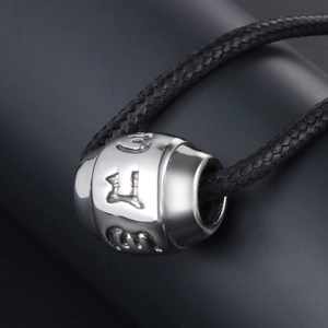 Titanium steel mantra barrel bead pendant on black woven rope for spiritual necklace