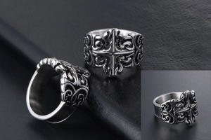 Detailed close-up of retro titanium steel ring featuring gothic cross and floral engravings