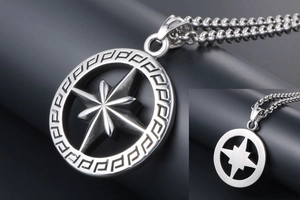 Detailed view of hollow octagonal star pendant with Greek fret pattern on bead chain