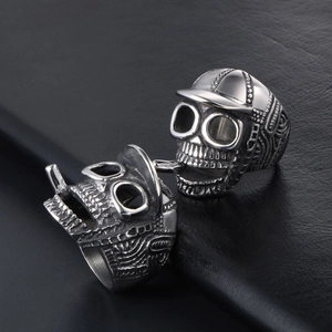 Vintage silver skull ring set with baseball cap design and punk style embossed details