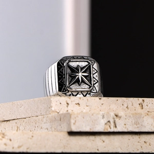 Vintage punk signet ring for men with embossed star pattern on stainless steel band