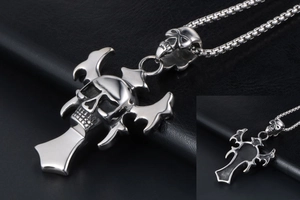 Macro detail of gothic skull cross pendant featuring polished titanium steel back structure