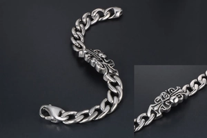 Macro view of vintage Gothic titanium steel bracelet with cross flower hollowed patterns