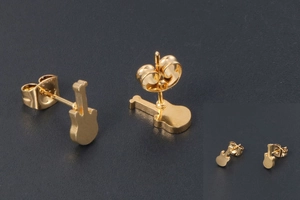 Detailed macro view of gold-plated guitar stud earrings with butterfly back closures