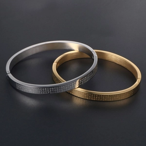 Titanium steel Heart Sutra bangles in gold and silver finish with engraved scriptures