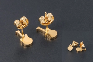 Macro detail of gold-plated guitar stud earrings featuring intricate neck and body design