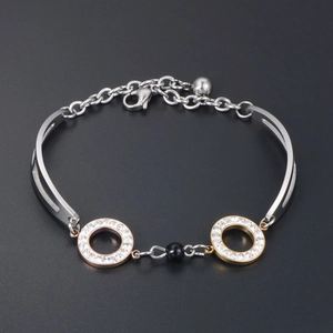 Titanium steel bracelet with rose gold pavé rings and black bead in minimalist design