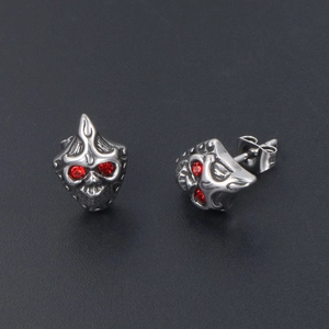 Punk style titanium steel skull stud earrings with red rhinestone eyes and retro silver finish