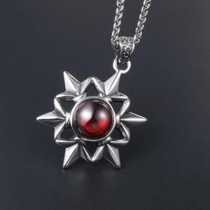 Retro stainless steel necklace featuring an eight-pointed star pendant with a red gemstone