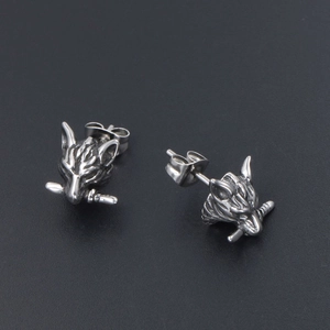 Retro punk wolf head stud earrings with sword detail in vintage titanium steel finish