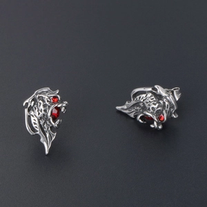 Punk style lion head earrings in silver titanium steel with red crystal eyes and details