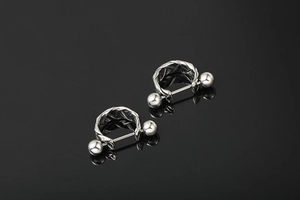 Detailed close-up of braided twist barbell earrings in polished silver stainless steel